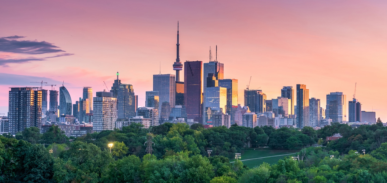 canadian cities cost of living toronto skyline summer